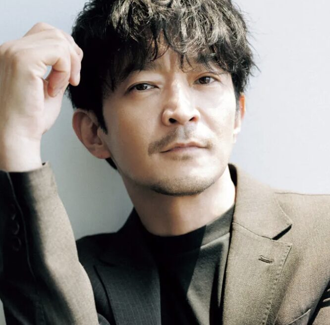 津田健次郎の決め顔